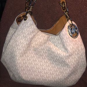 Michael Kors vanilla wallet and purse